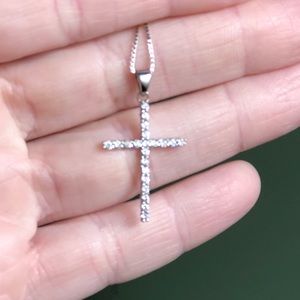 Diamond 18” cross white gold necklace.